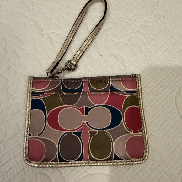 Coach Handbags - Coach Stylish Multicolor Wristlet